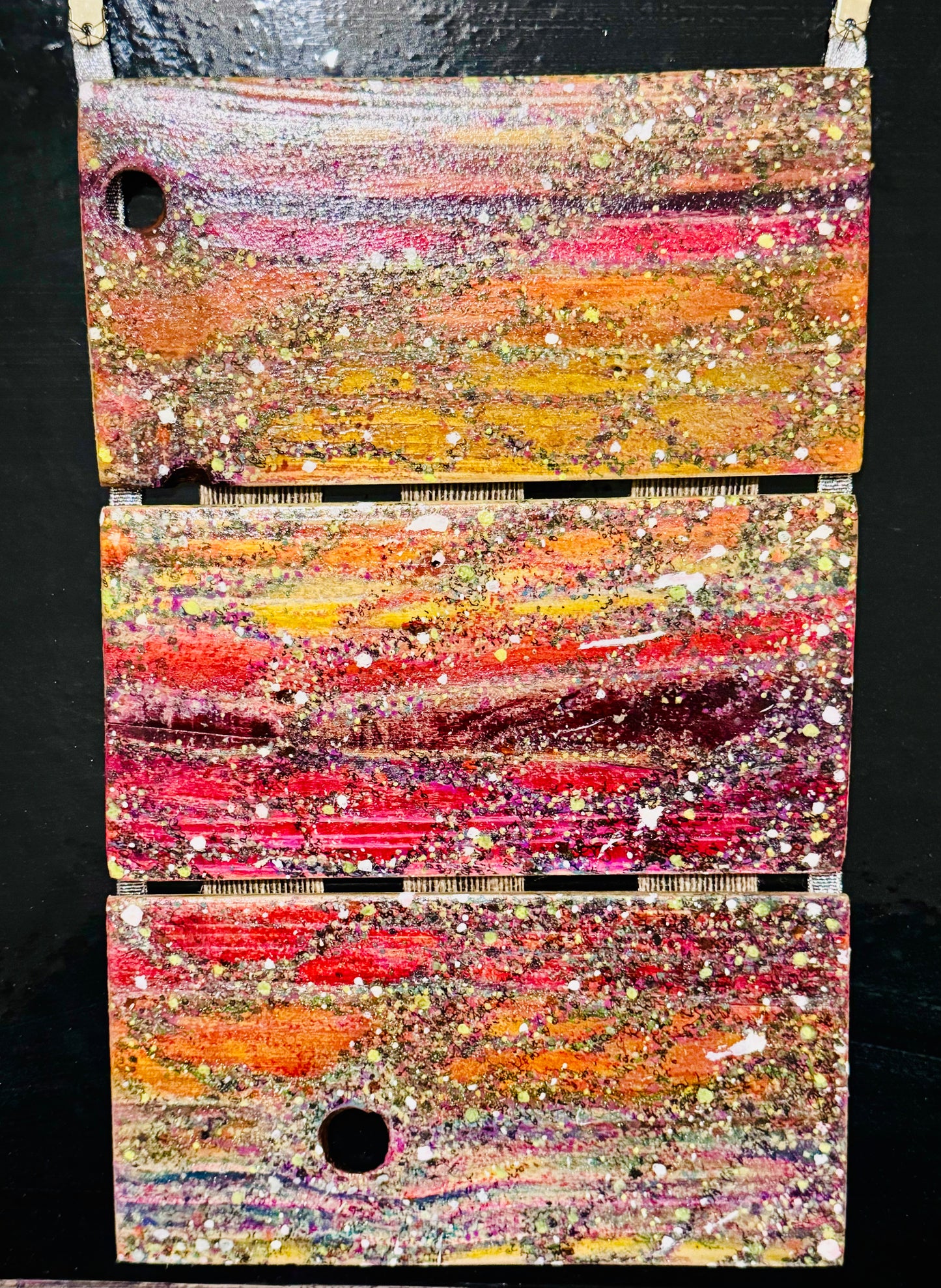 ‘Triple Sunset’ painted on upcycled feather panels